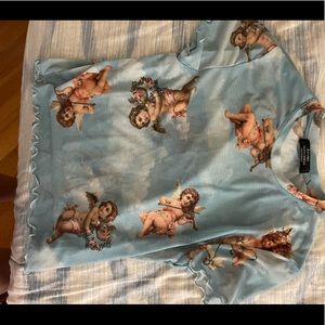 This shirt is a medium and is mesh material